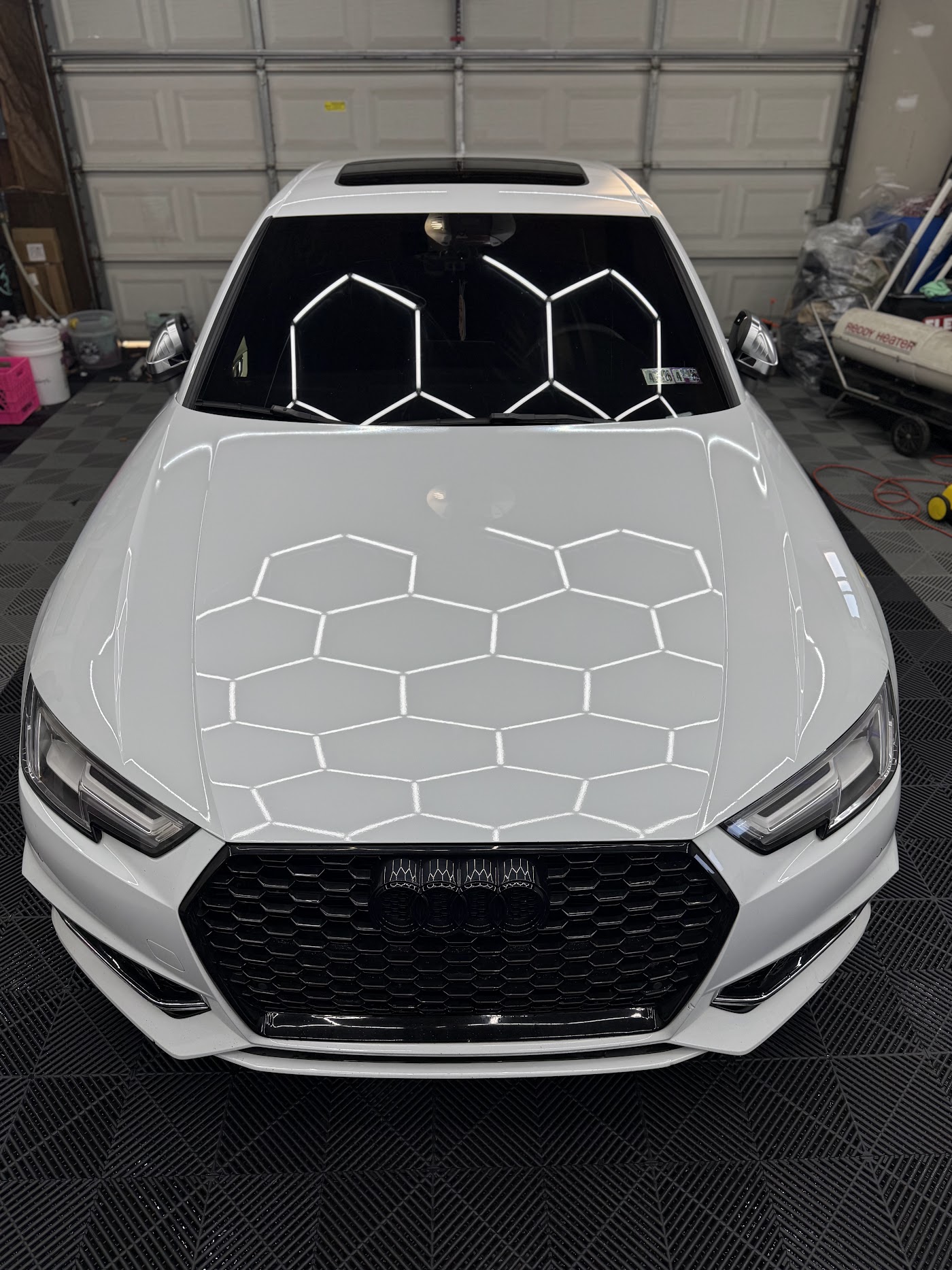 White Audi RS 3 fresh from paint correction, studio shot
