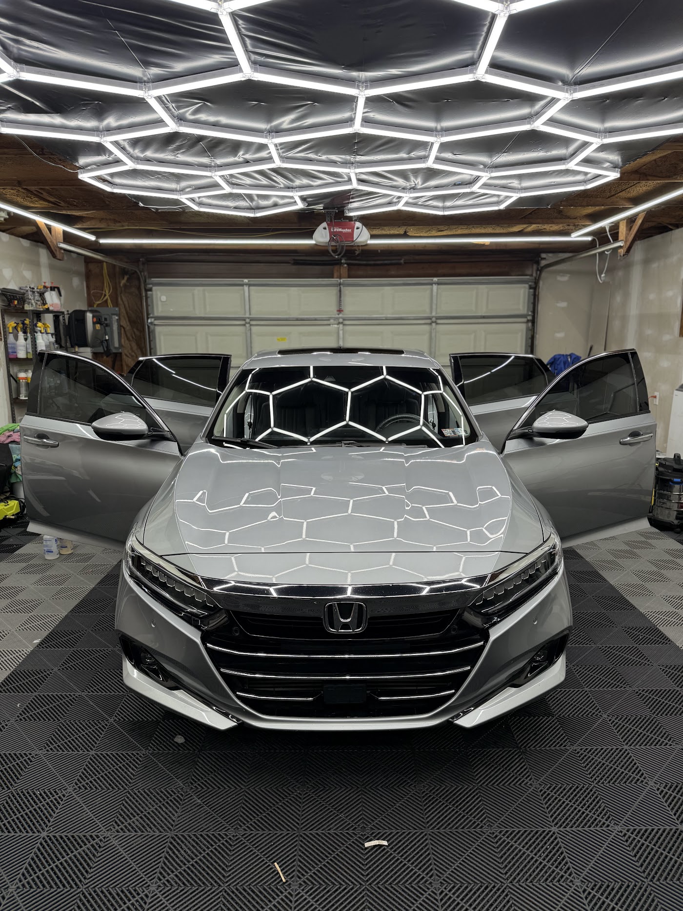 Silver Honda Accord with a spotless finish in the bay