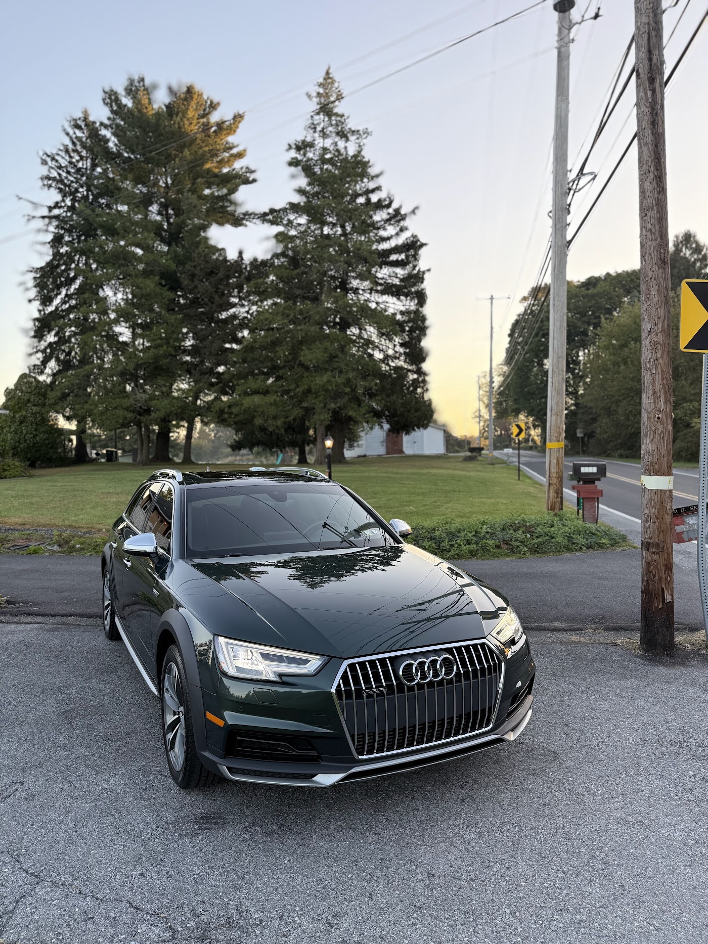 Green Audi sedan with corrected, glossy paint